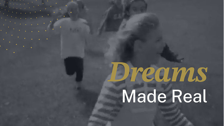 Five children run after one another in a field, smiling. The text “Dreams Made Real” appears on the image. 